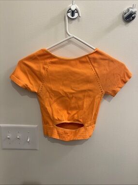 Free people movement Orange Ribbed Cutout Crop Top